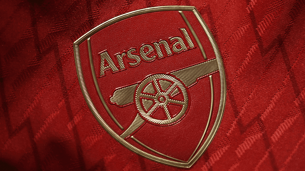 Arsenal's badge on our home shirt