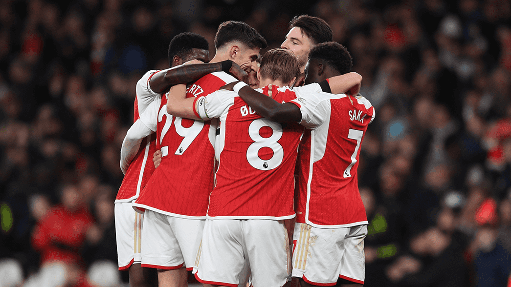 Arsenal celebrate scoring against Chelsea