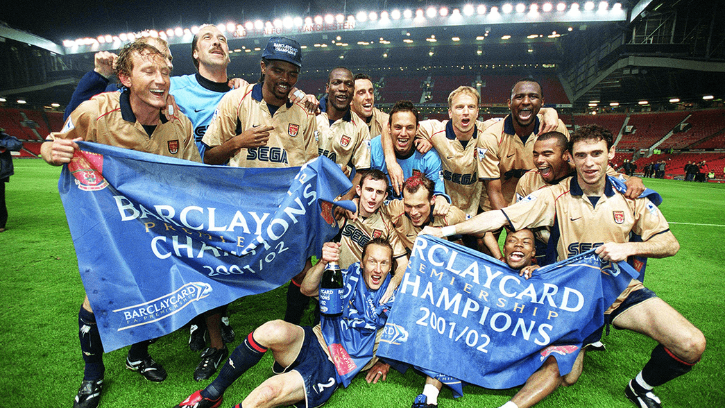 Arsenal celebrate winning the league at Old Trafford in 2002