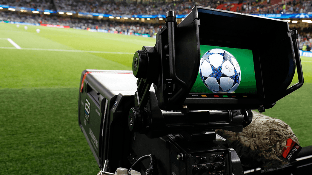 A TV camera filming a Champions League game