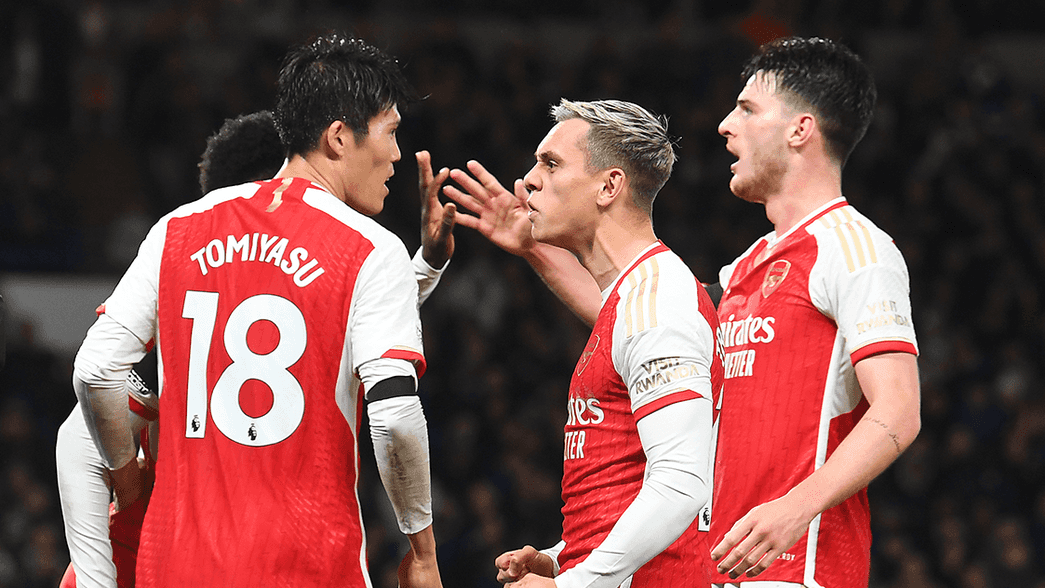 Arsenal celebrate their equaliser against Chelsea