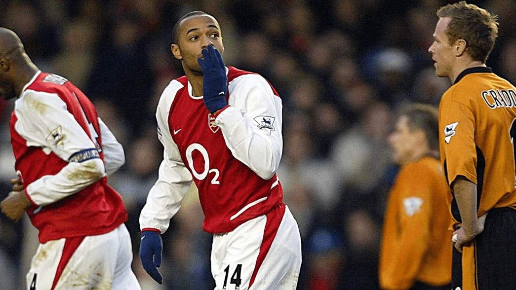 Thierry Henry celebrate scoring against Wolves in 2003