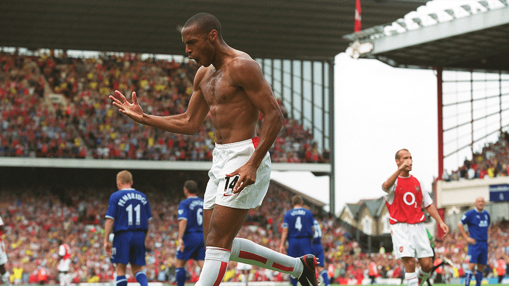 Thierry Henry celebrates scoring against Everton in 2003