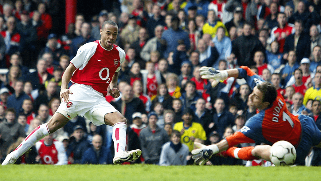 Thierry Henry scores against Liverpool in 2004