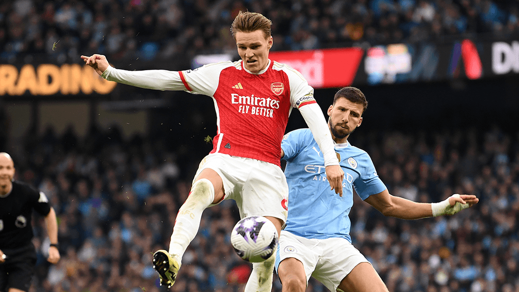 Martin Odegaard in action against Manchester City