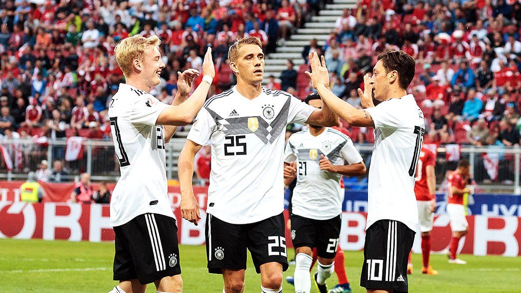 Mesut Ozil celebrates with Germany