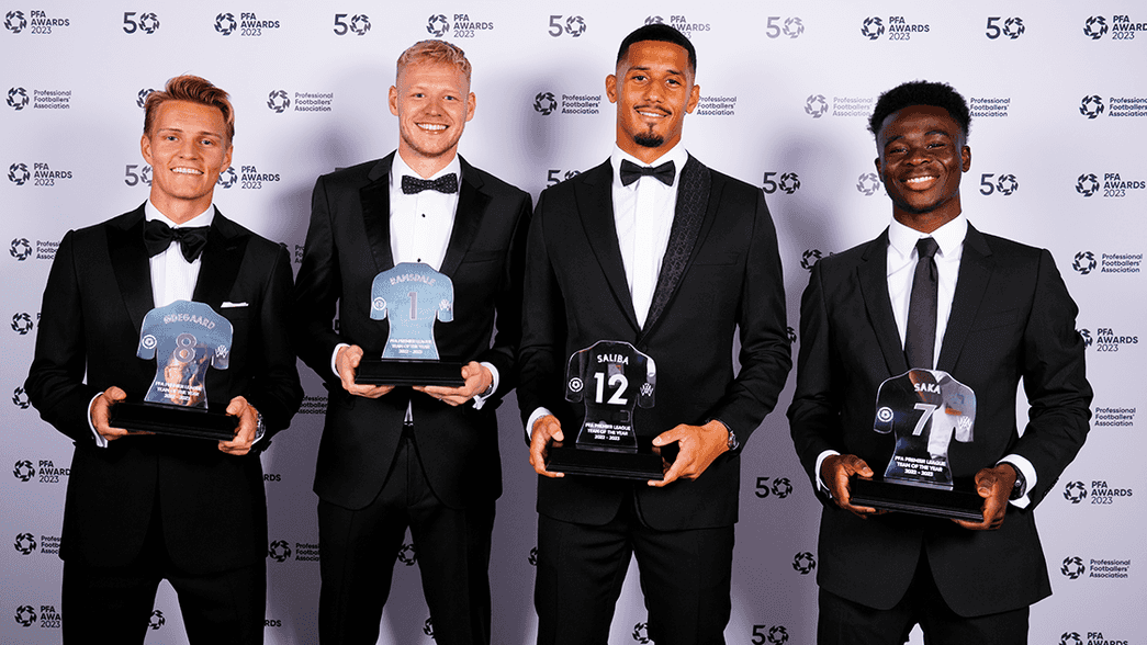 Martin Odegaard, Aaron Ramsdale, William Saliba and Bukayo Saka with their Team of the Year trophies