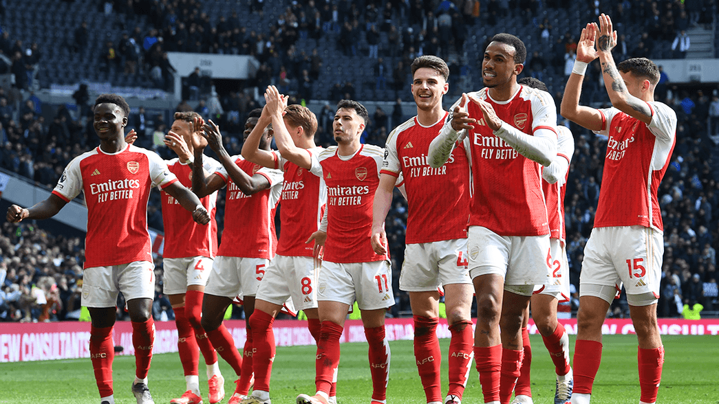 Arsenal celebrate after beating Tottenham