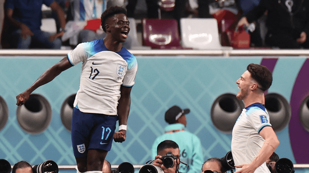 Declan Rice and Bukayo Saka celebrate scoring for England