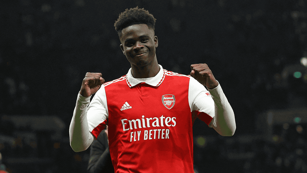 Bukayo Saka celebrates after beating Tottenham Hotspur