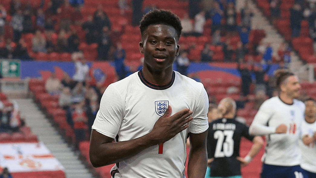 Bukayo Saka celebrates scoring for England