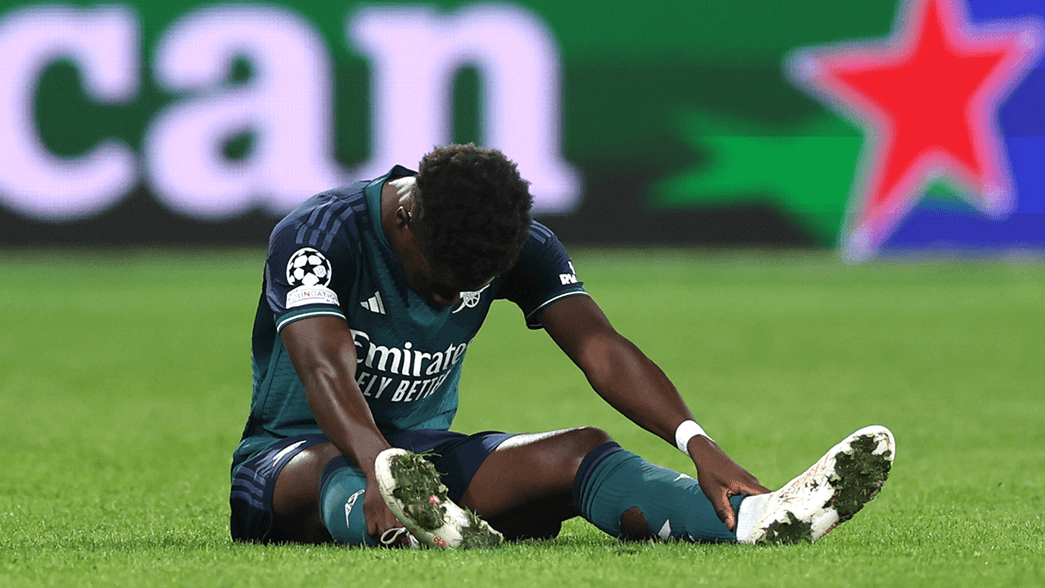 Bukayo Saka on the turf injured during our game against Lens