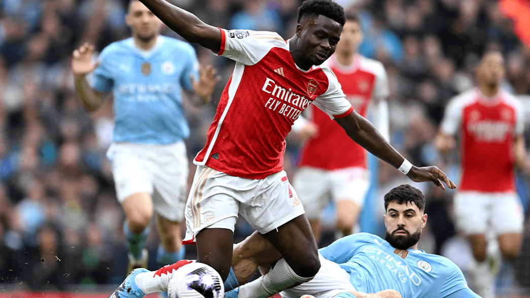 Bukayo Saka playing against Manchester City