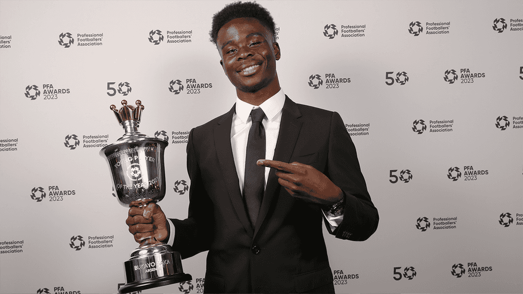 Bukayo Saka with the PFA Young Player of the Year trophy