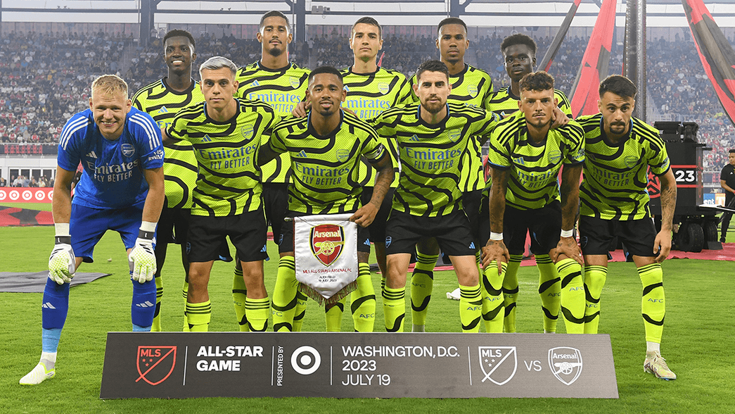 The Arsenal team line up for a pre-match photo