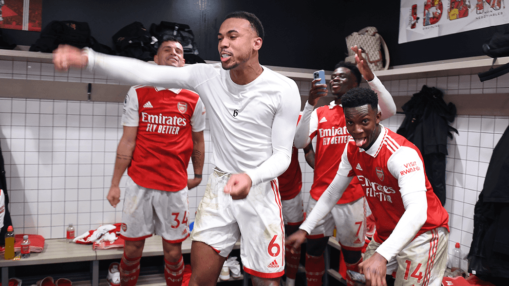 Arsenal celebrate their win against Tottenham Hotspur in the changing room