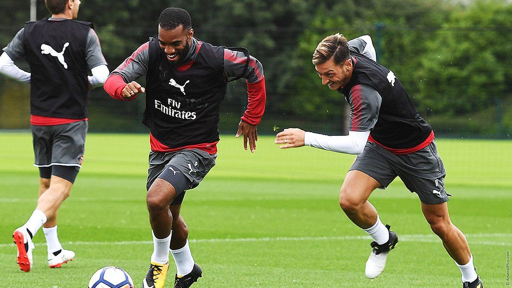 Alexandre Lacazette and Mesut Ozil in training