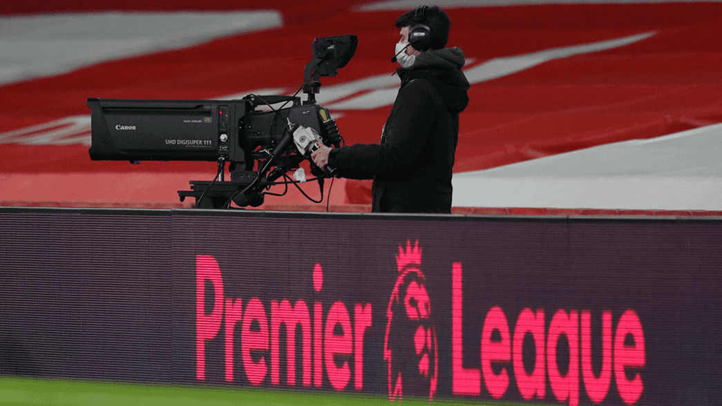 A cameraman at Emirates Stadium