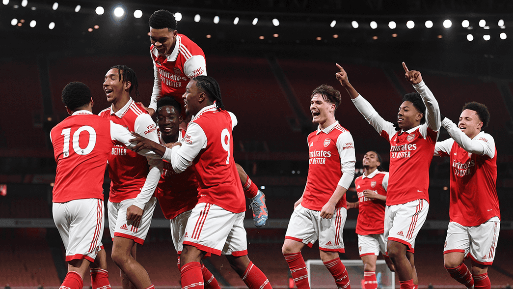 Arsenal's under-18s celebrate scoring against Cambridge United