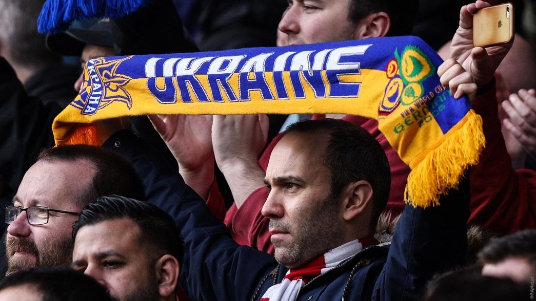 An Arsenal fan shows his solidarity with Ukraine