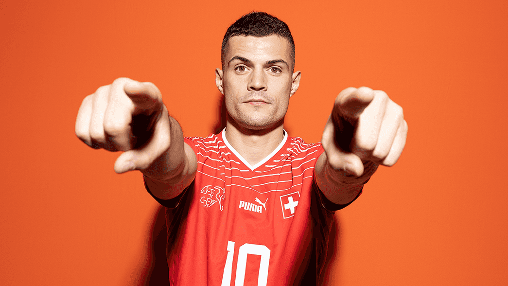 Granit Xhaka posing for a publicity shot before the 2022 World Cup