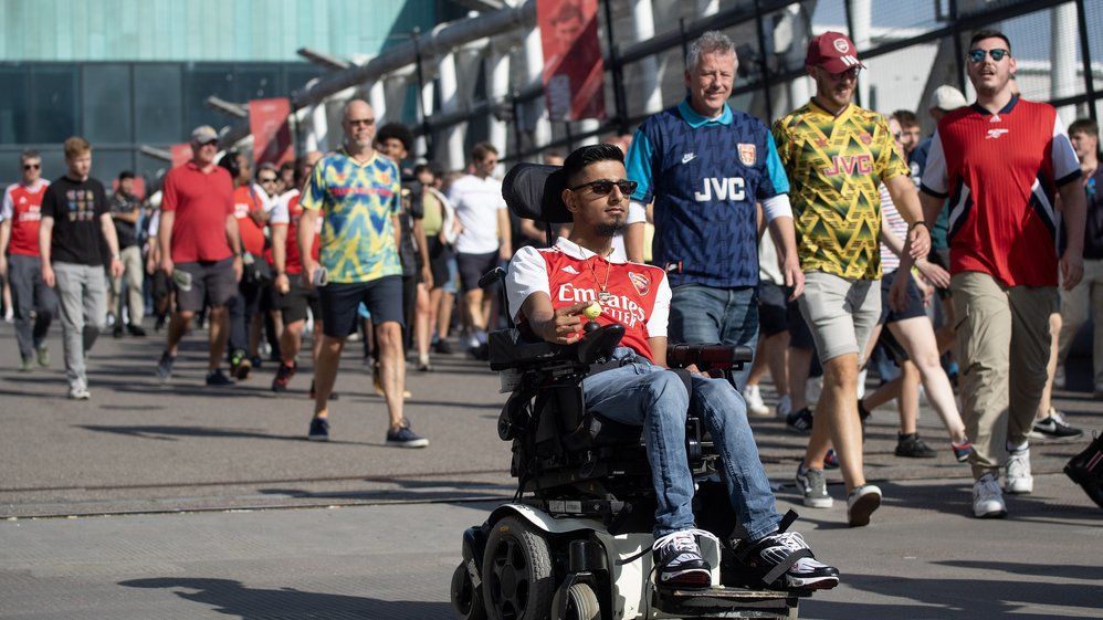 Wheelchair user on way to Emirates Stadium
